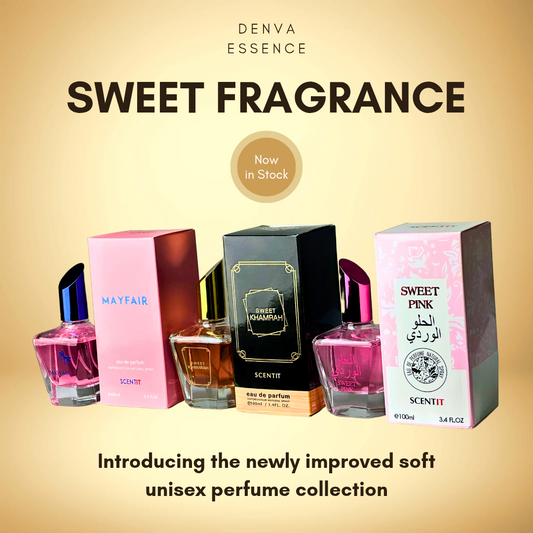 A promotional image for Denva Essence perfumes, featuring four different scents: Mayfair, Sweet Khamrah, and Sweet Pink. The perfumes are displayed in their bottles and boxes against a festive, dotted gold background with Christmas ornaments and a red ribbon. The text "Sweet Fragrance" is prominently displayed, along with "Now in Stock" and "Introducing the newly improved soft unisex perfume collection.