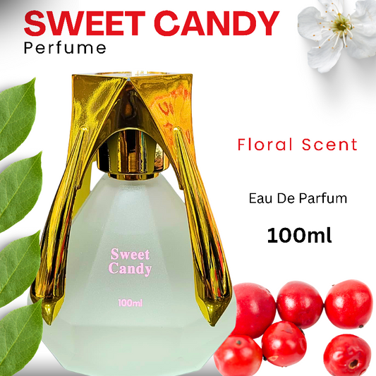 A photo of a 100ml bottle of Sweet Candy Perfume. The bottle is clear glass with a gold cap and base. The label reads "Sweet Candy" and "Eau de Parfum." Flowers and berries are shown around the bottle.